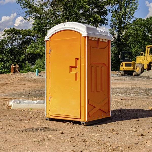 what is the cost difference between standard and deluxe portable toilet rentals in Washington County TX